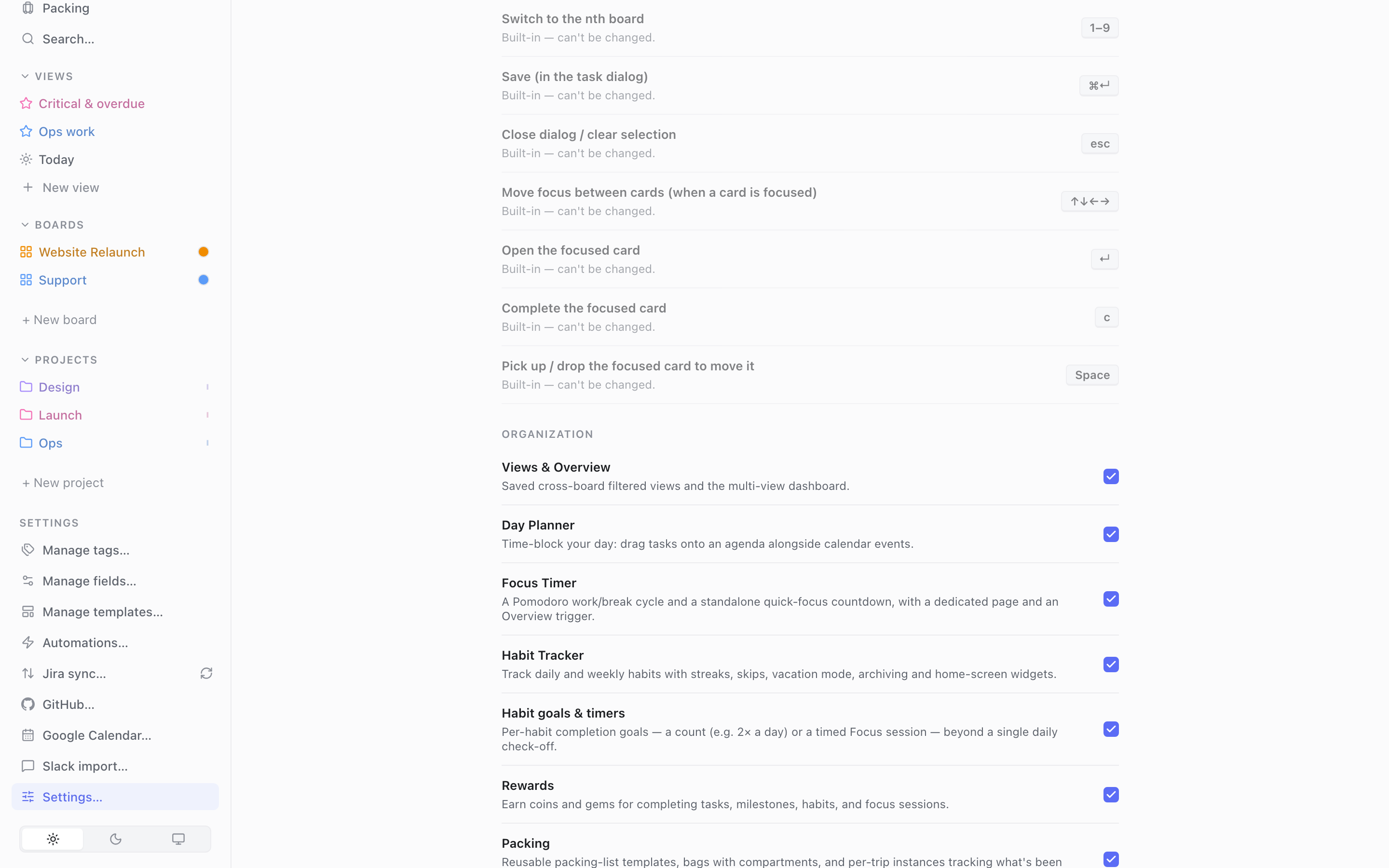 The Settings page's Organization feature toggles, listing Views &amp; Overview, Day Planner, Focus Timer, Habit Tracker, Habit goals &amp; timers, Rewards, and Packing, each with an on/off switch